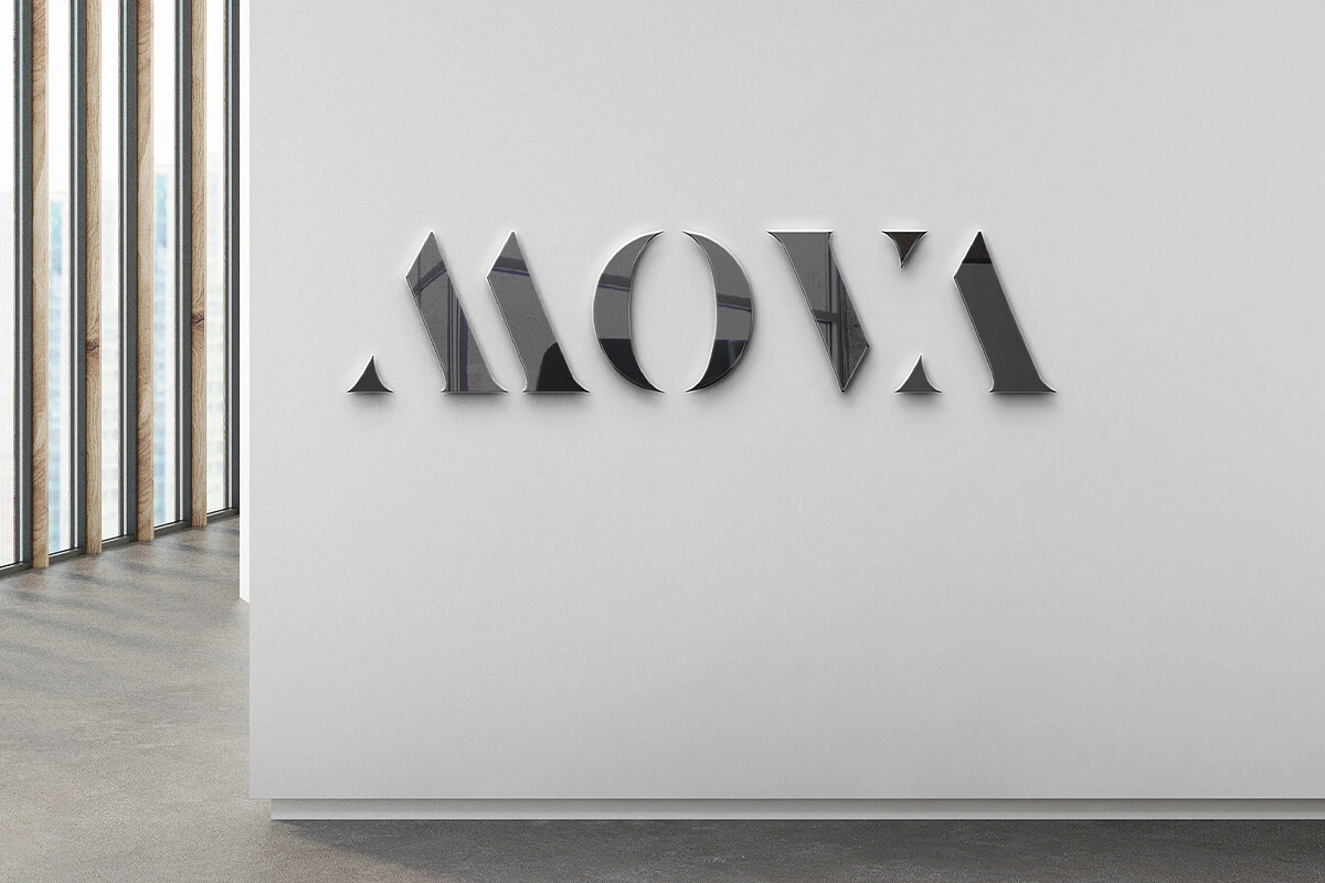 The indoor metallic 3D logo, mounted on a wall.