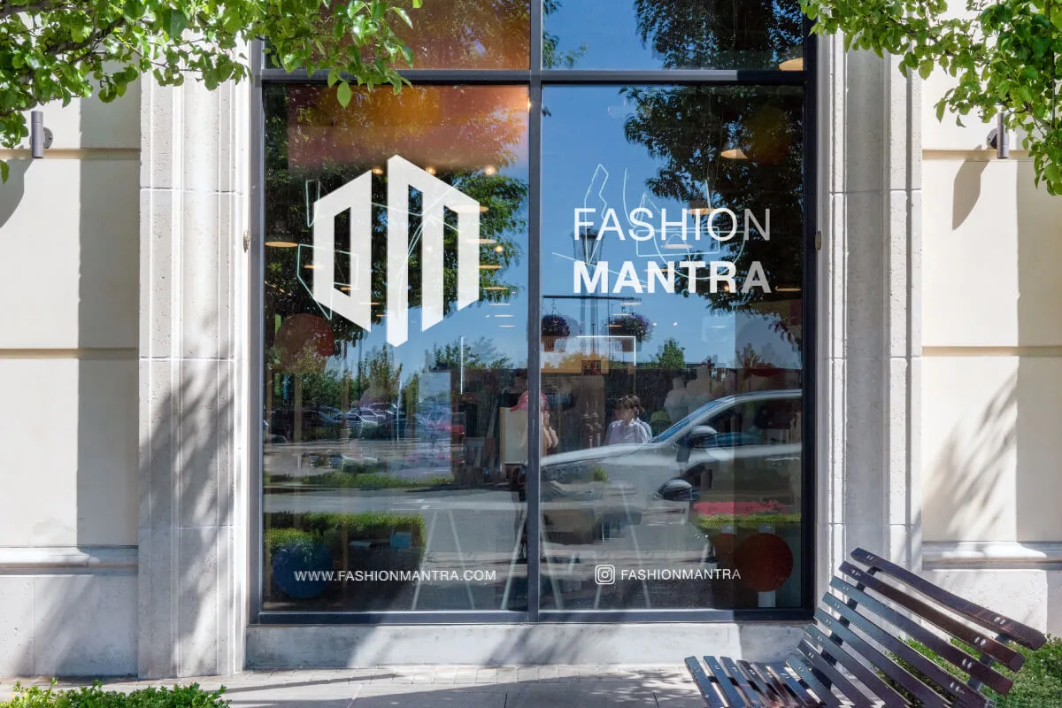 Custom-cut vinyl logo for a window shop.