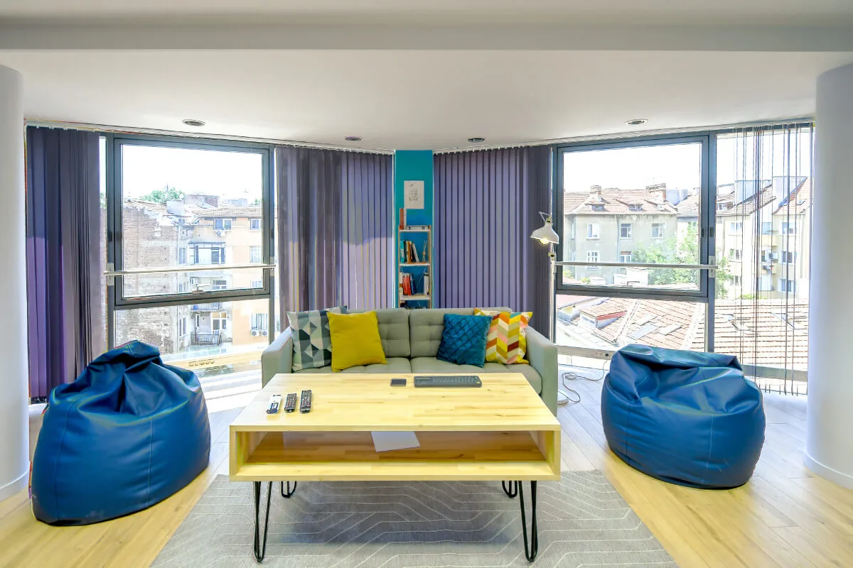A photograph of the couch and custom-made table we used in the relax room at the Parachut office.