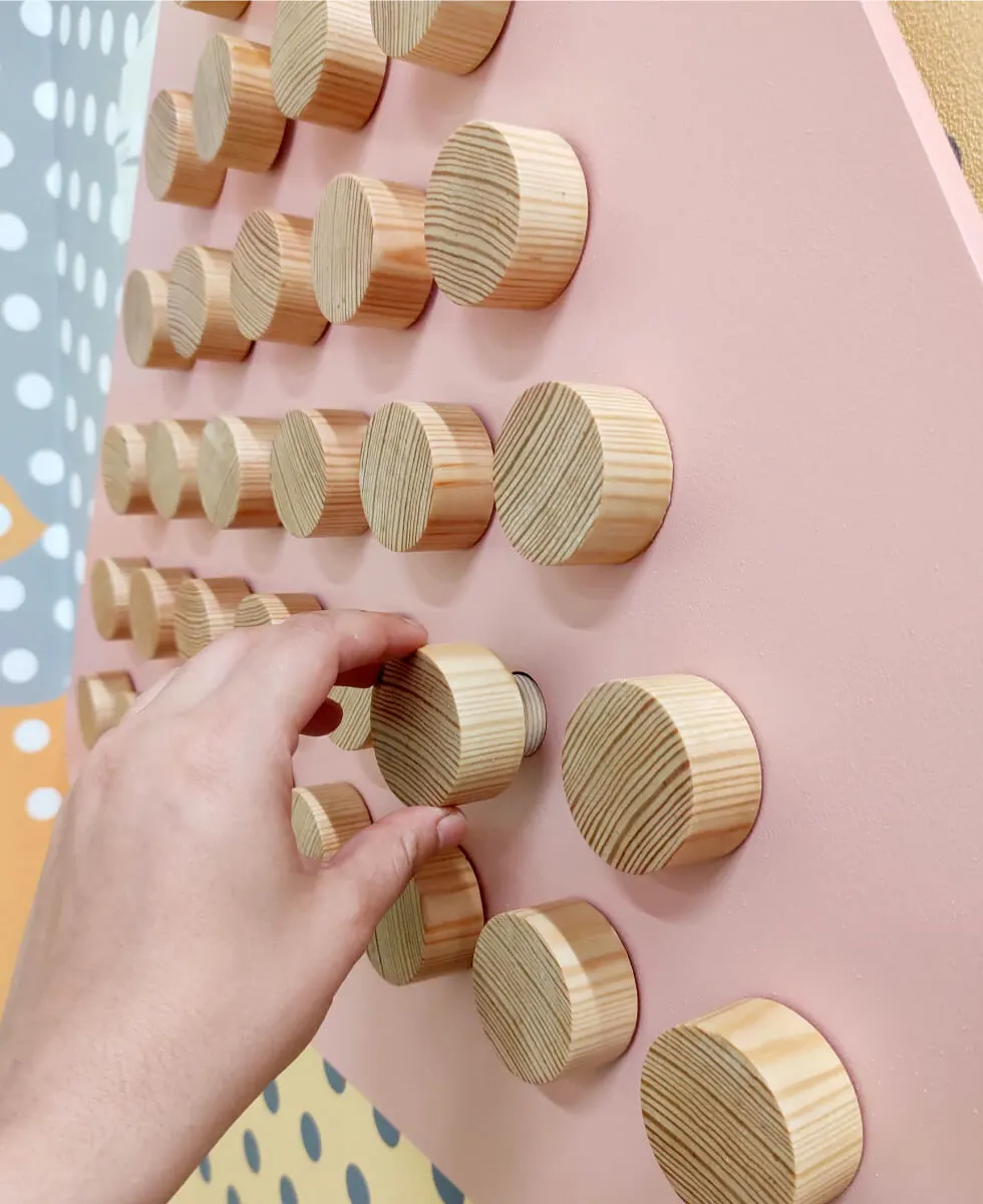 A custom wooden pin game we designed and installed in the VMware office.
