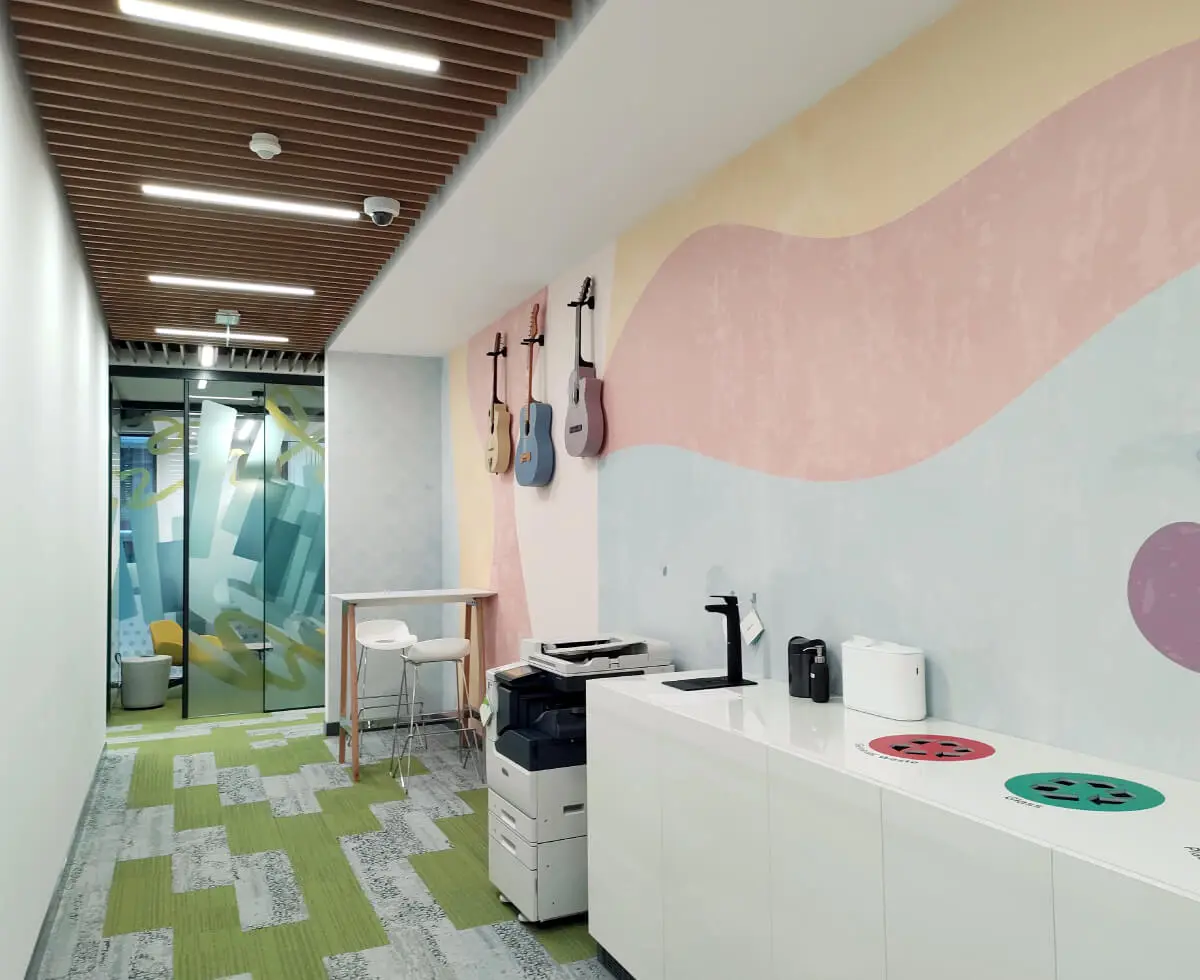 A custom wallpaper and hanging decorative guitars we designed and installed for one of the hallways in the VMware offices.