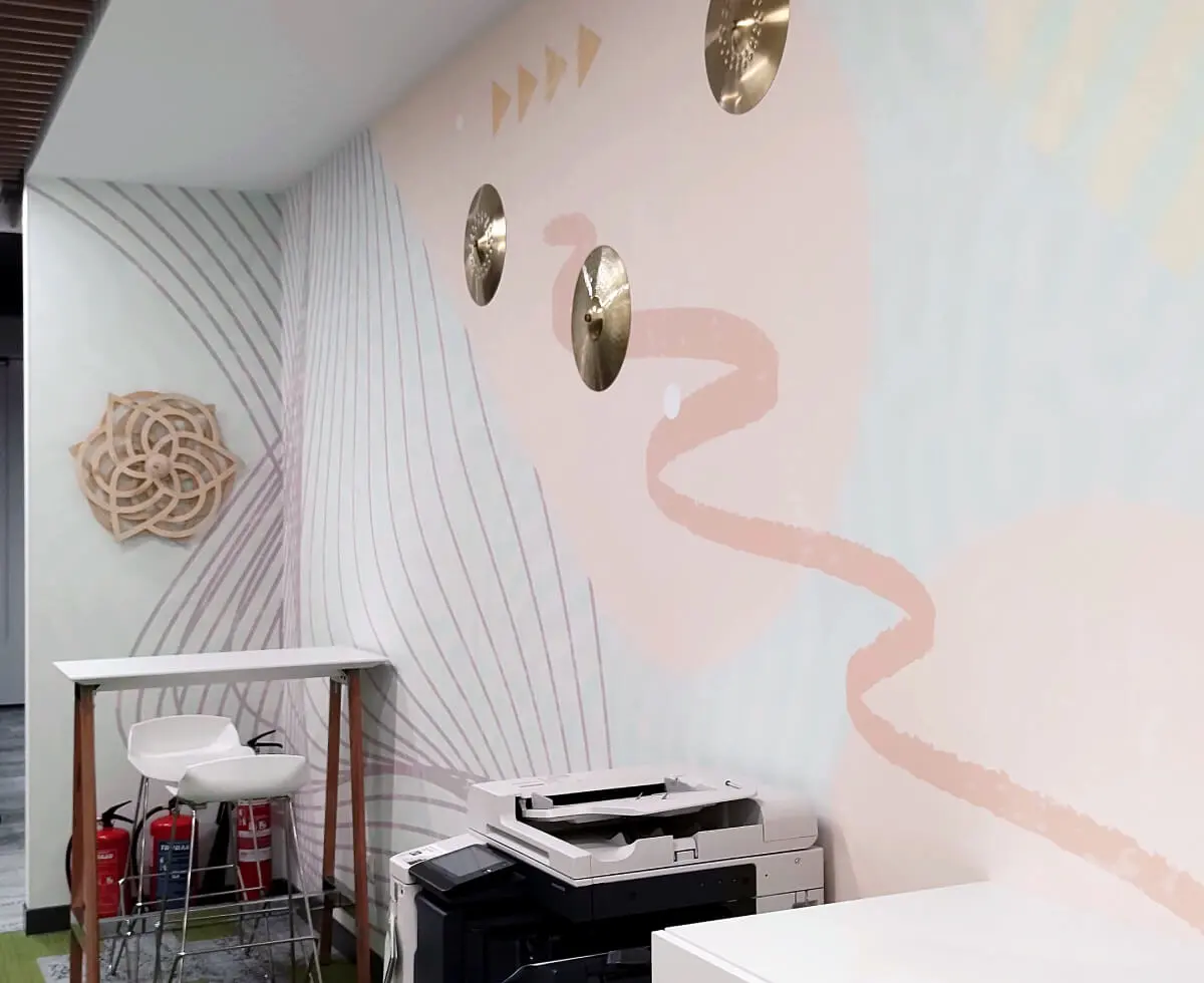 A custom wallpaper with 3D interactive elements we designed and installed for one of the printing zones in the VMware offices.