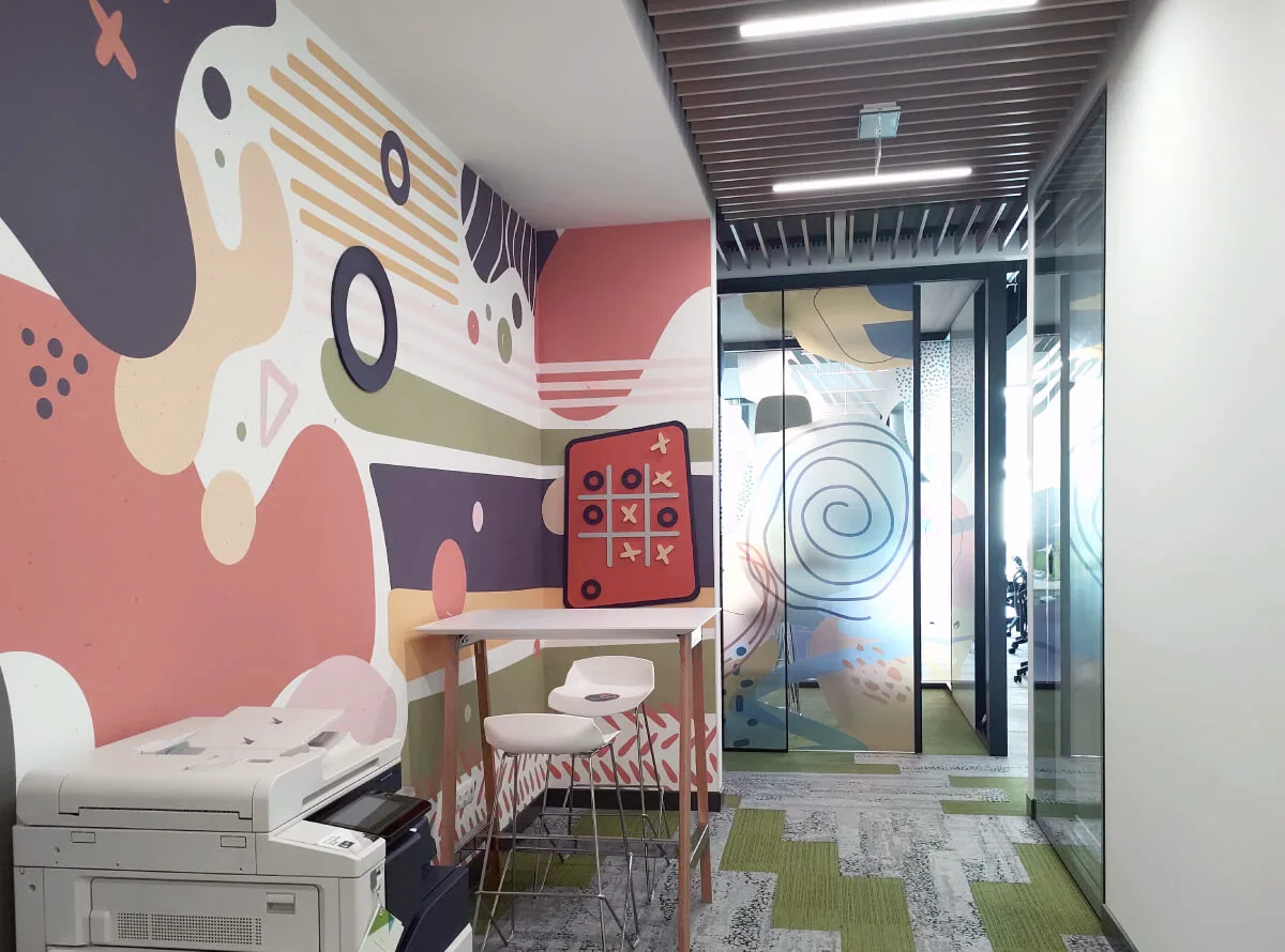 A custom wallpaper with 3D interactive magnetic tic tac toe game we designed and installed for one of the print areas in the VMware offices.