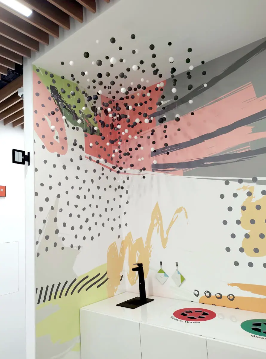 A custom wallpaper with 3D ornaments we designed and installed for one of the print areas in the VMware offices.