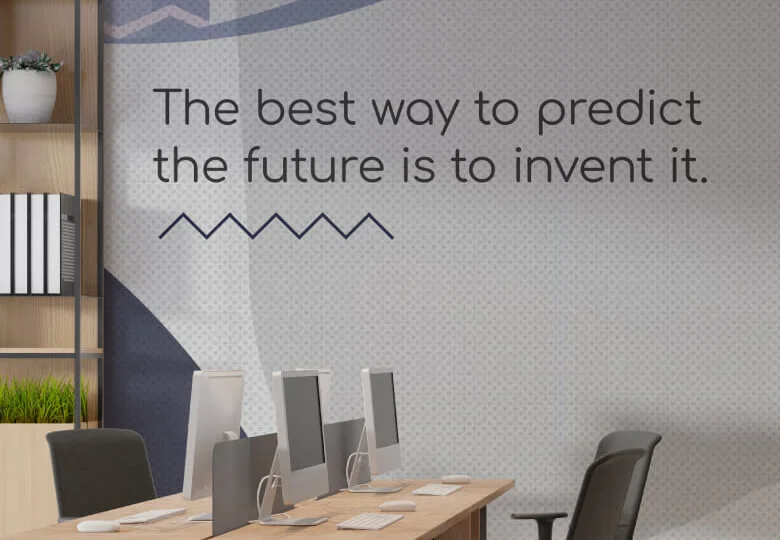 Branded modern office with motivational quote on the wall